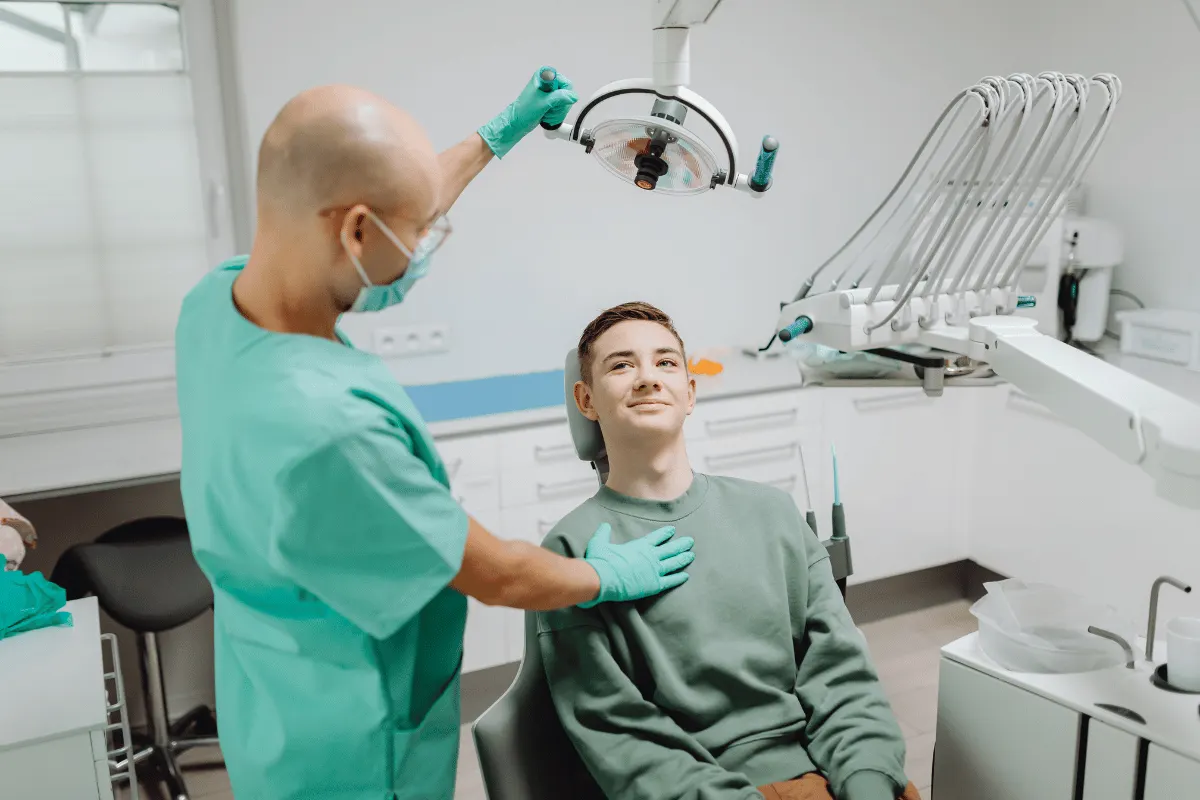 Dentist consulting with a patient at a Kitchener clinic