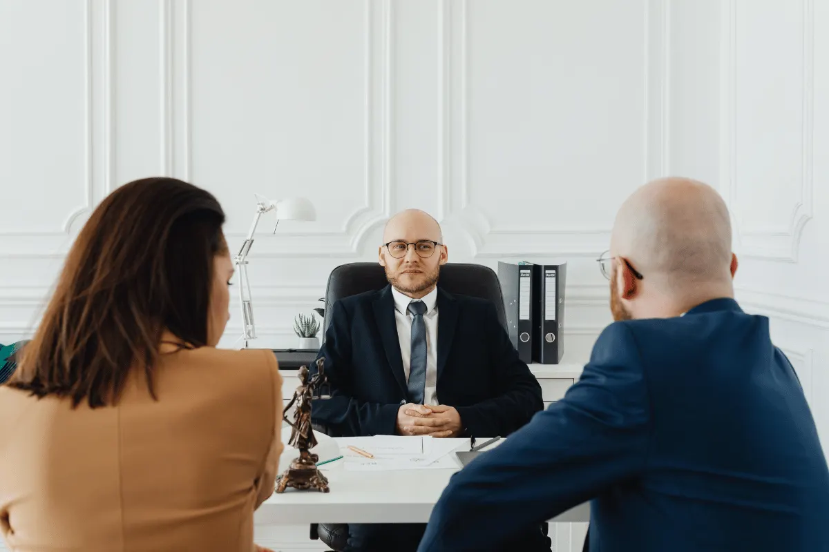 Lawyer meeting a client in a Kitchener office