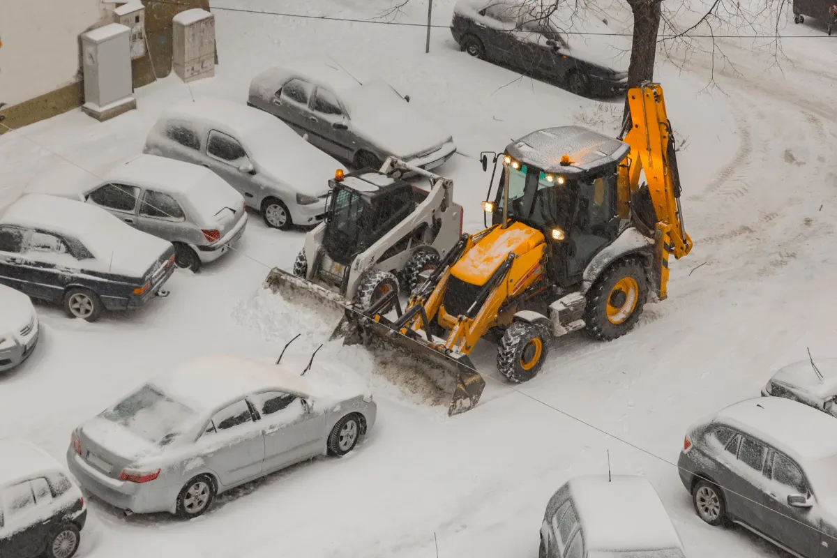 Commercial snow removal clearing a Kitchener parking lot